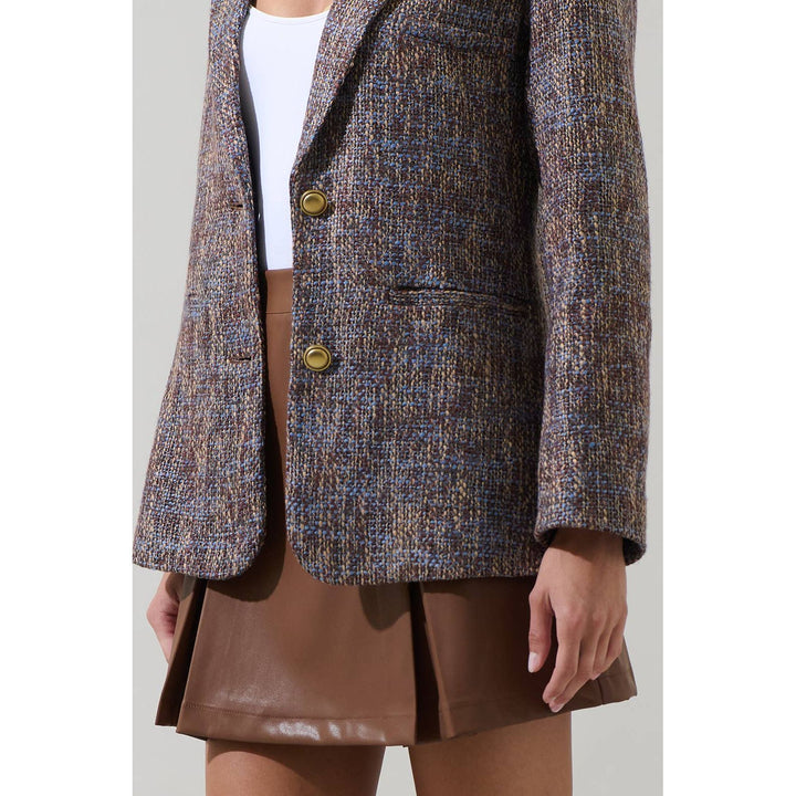 Textured tweed oversized blazer in earthy brown and blue tones with gold-tone buttons for stylish layering
