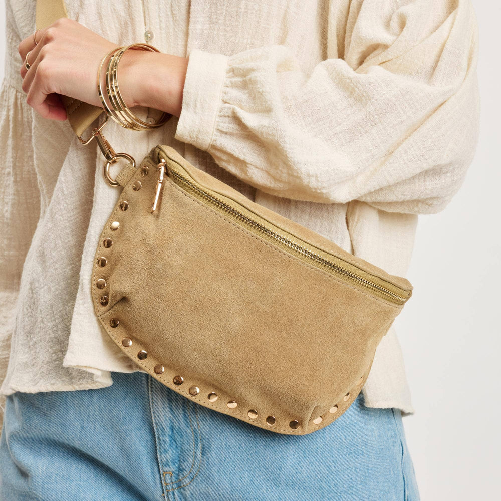 Beige suede gizelle-suede belt bag with gold-tone studs and zipper designed as a stylish fanny pack bone color