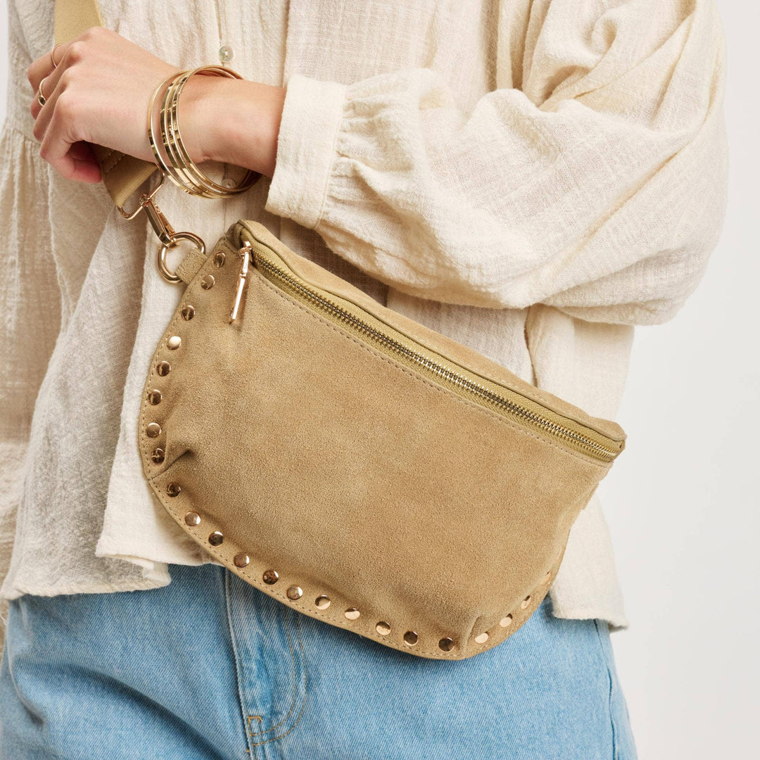 Beige suede gizelle-suede belt bag with gold-tone studs and zipper designed as a stylish fanny pack bone color