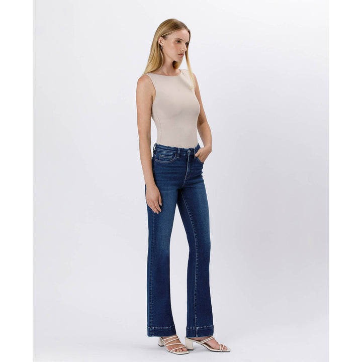 High rise trouser denim in dark blue flared high-rise jeans with classic five-pocket design and rolled cuffs