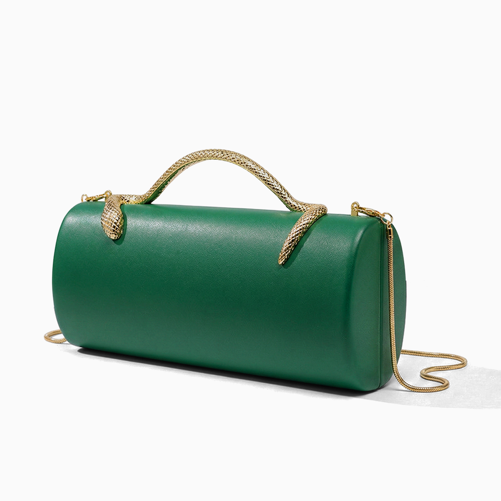 Emerald green cylindrical clutch with gold snake-handled top and matching chain strap maren handbag green