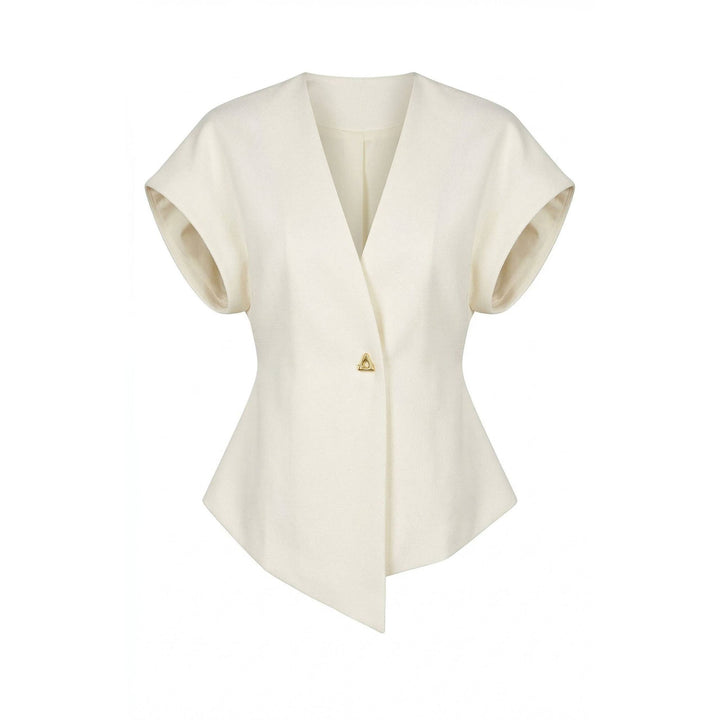 Cream-colored textured wrap top with short sleeves v-neck peplum hem and gold triangular button at center front