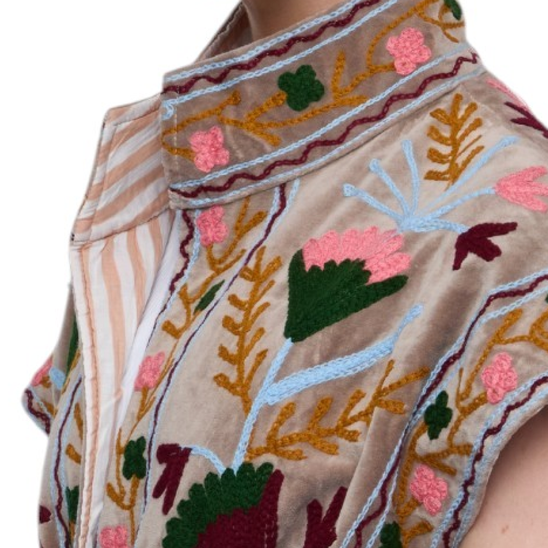 Beige velvet sleeveless top with intricate pink green gold and maroon floral embroidery from jaipur embroidered jacket gray