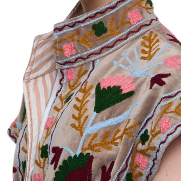Beige velvet sleeveless top with intricate pink green gold and maroon floral embroidery from jaipur embroidered jacket gray