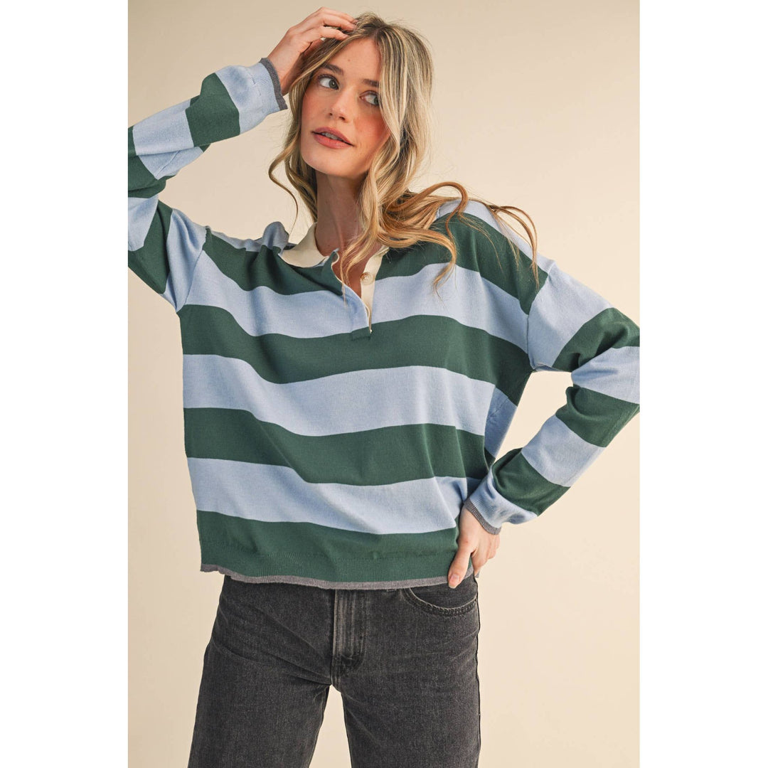 A cozy rugby sweater blue green with bold horizontal stripes in deep green and soft light blue
