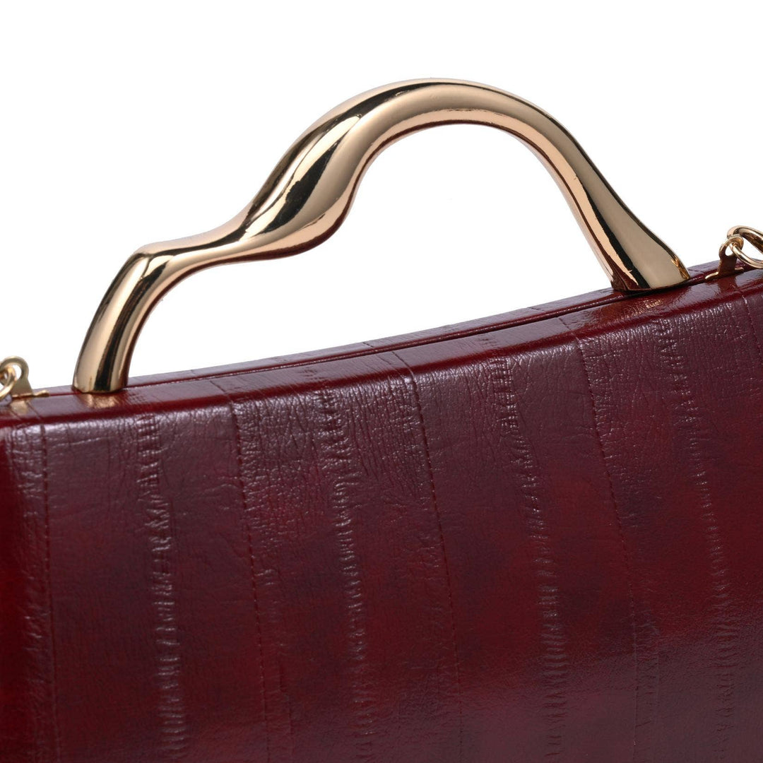 Nichelle clutch burgundy handbag with textured reptile skin finish and sleek gold-tone curved handle