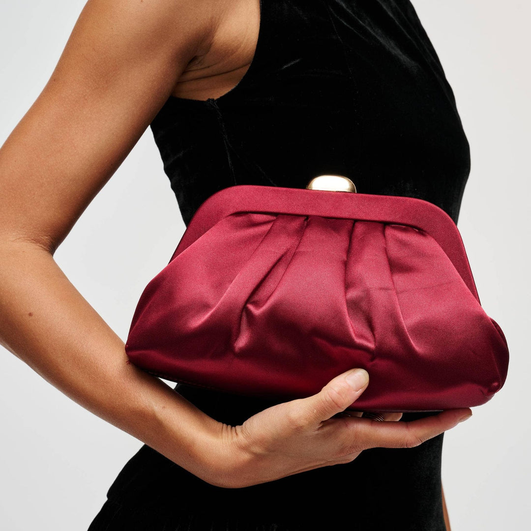 Evening clutch burgundy sleek satin with gold-toned clasp and soft pleated detailing for formal occasions