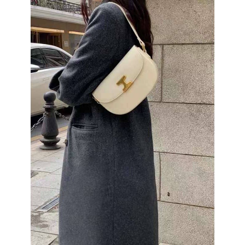 Cream-colored leather shoulder bag ivory with gold-tone h clasp crossbody style
