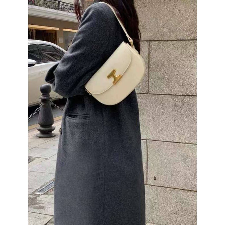 Cream-colored leather shoulder bag ivory with gold-tone h clasp crossbody style