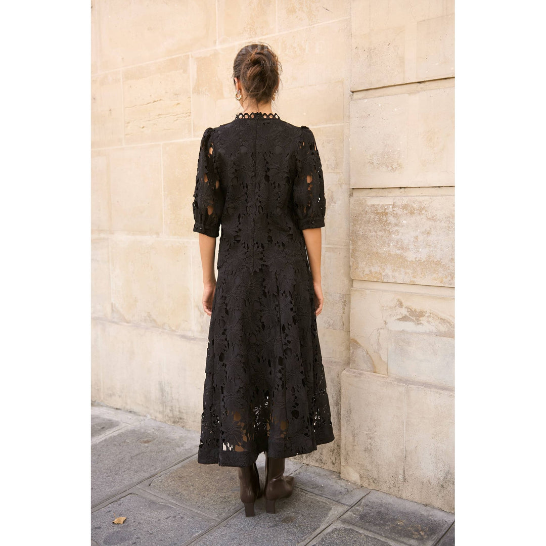 Black lace midi dress with three quarter sleeves and scalloped neckline in daisy guipure skirt style