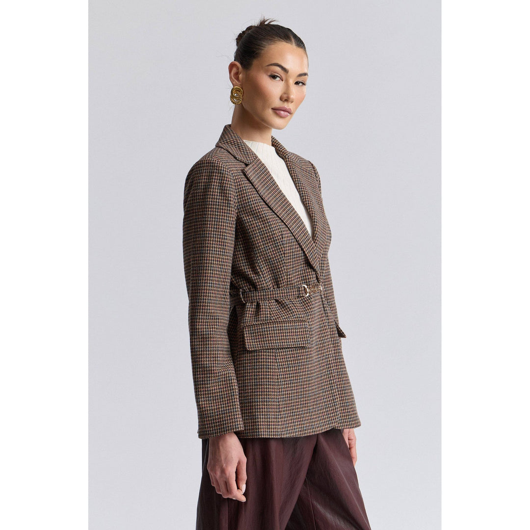 Brown and black houndstooth wool blazer with a belted waist for a stylish and tailored look