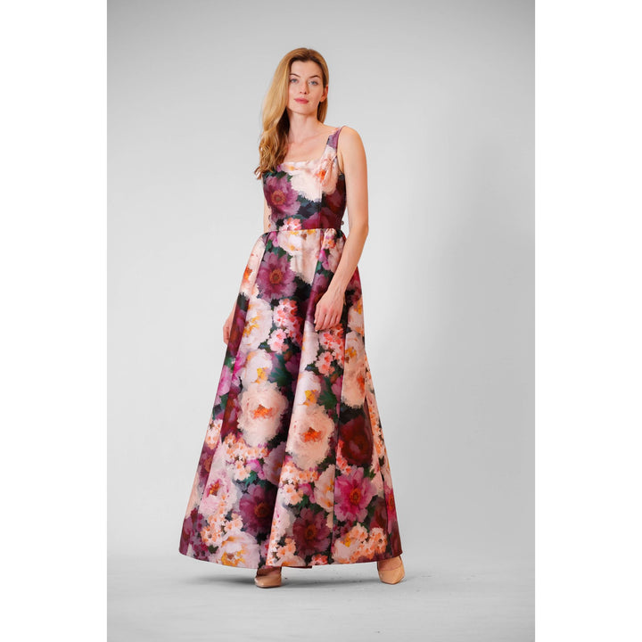 Mikado autumn floral gown is a flowing floor-length maxi dress with vibrant pink purple and maroon floral pattern on light background