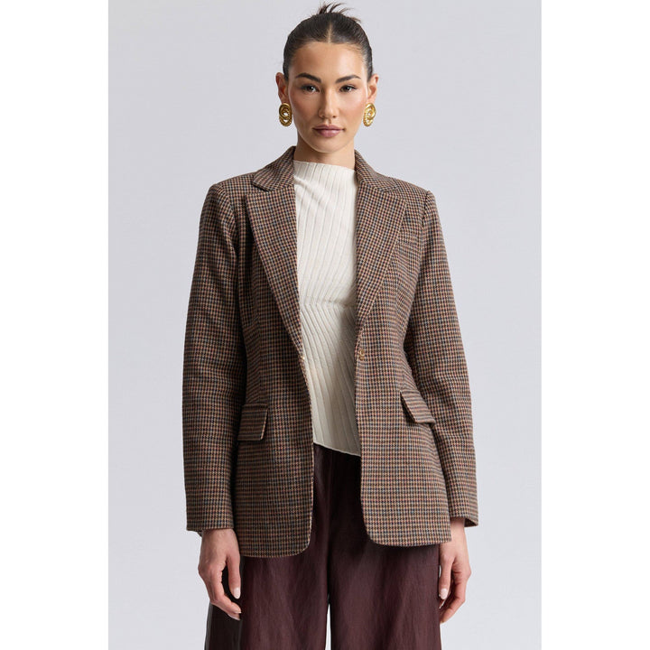 Brown and beige houndstooth wool belted blazer featuring classic pattern and tailored fit for stylish layered looks