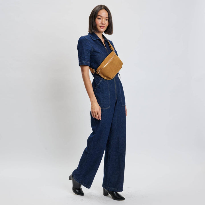Tan leather crossbody gizelle-suede belt bag with gold-tone hardware and adjustable strap for hands-free use