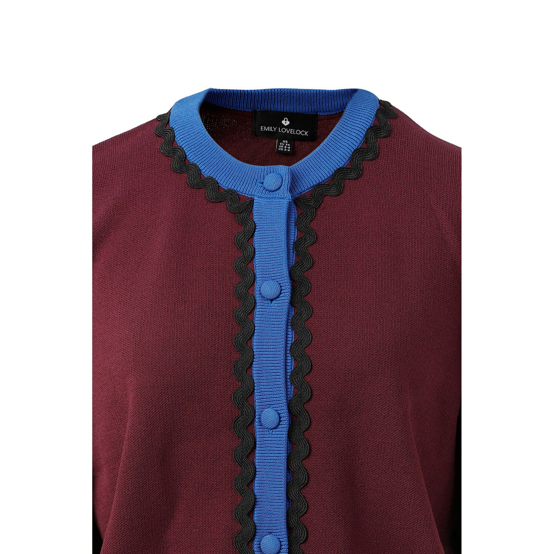 Diana cardigan maroon knit with blue ribbed collar and front placket black scalloped trim along edges