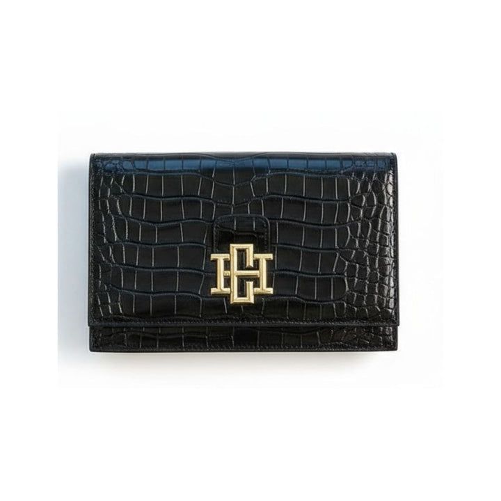 Black patent bryn clutch wallet with crocodile texture and gold-tone monogram clasp