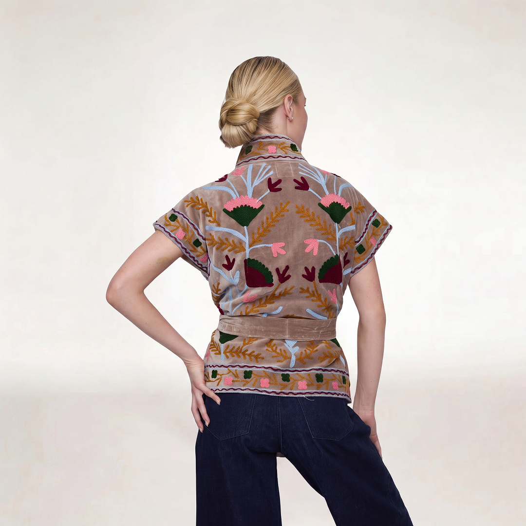 Beige velvet short-sleeved top with intricate pink green and gold floral embroidery from jaipur embroidered jacket gray collection