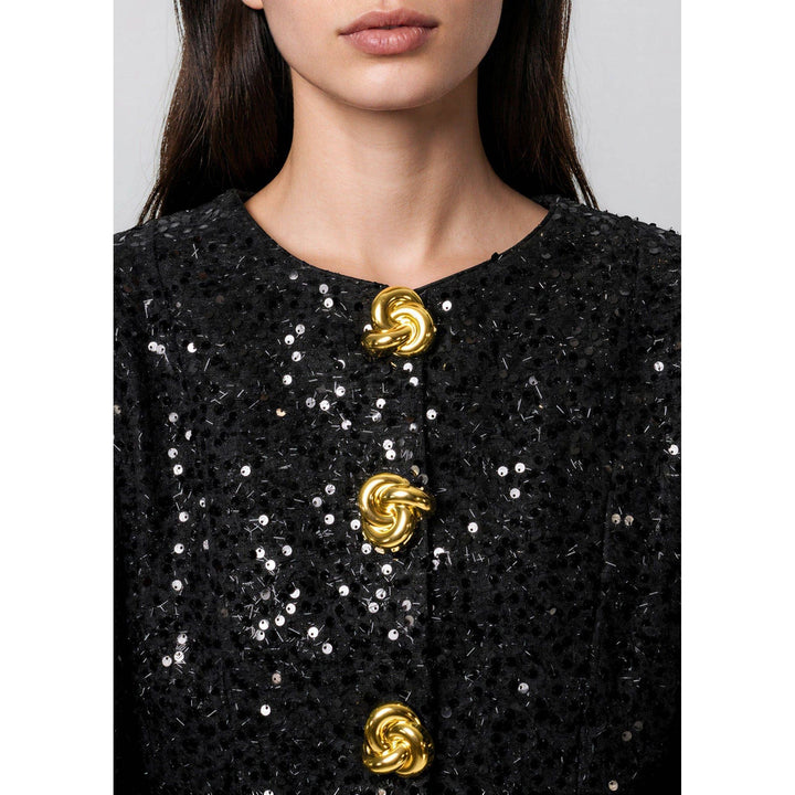 Black sequined tinsel balloon sleeve jacket with three gold knot-shaped buttons on front closure