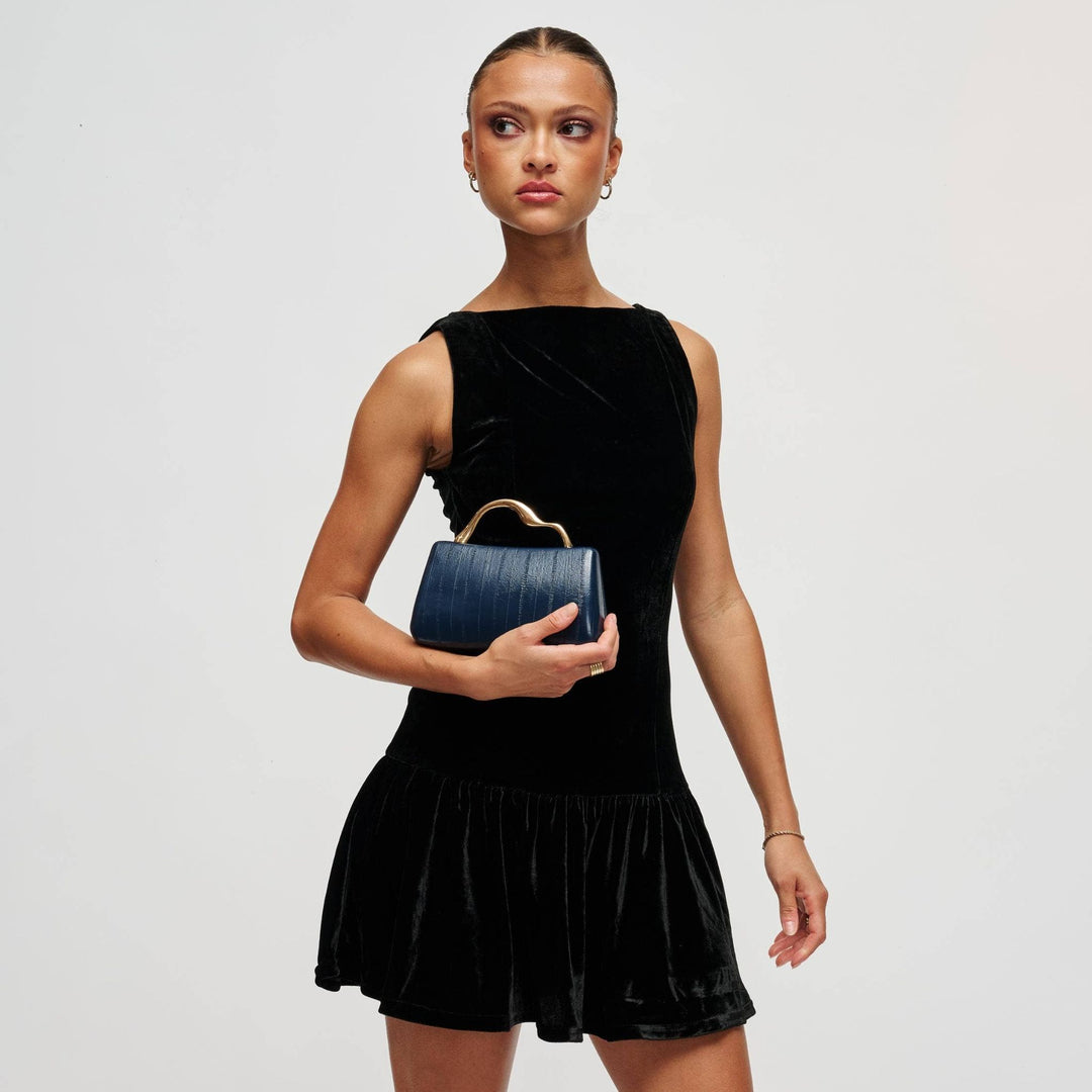 Navy blue crocodile-textured nichelle clutch with gold tone curved handle perfect for elegant evening use