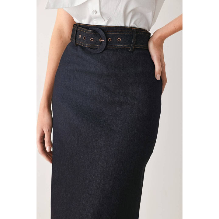 Dark denim pencil skirt with matching belt and circular buckle in classic denim material for a sleek look