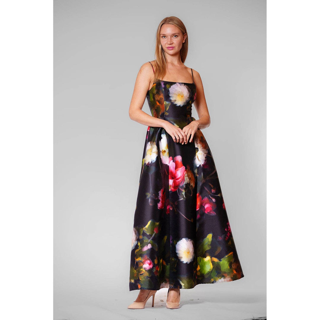 Elegant black satin maxi dress midnight garden gown with vibrant white pink red floral print and green leaves