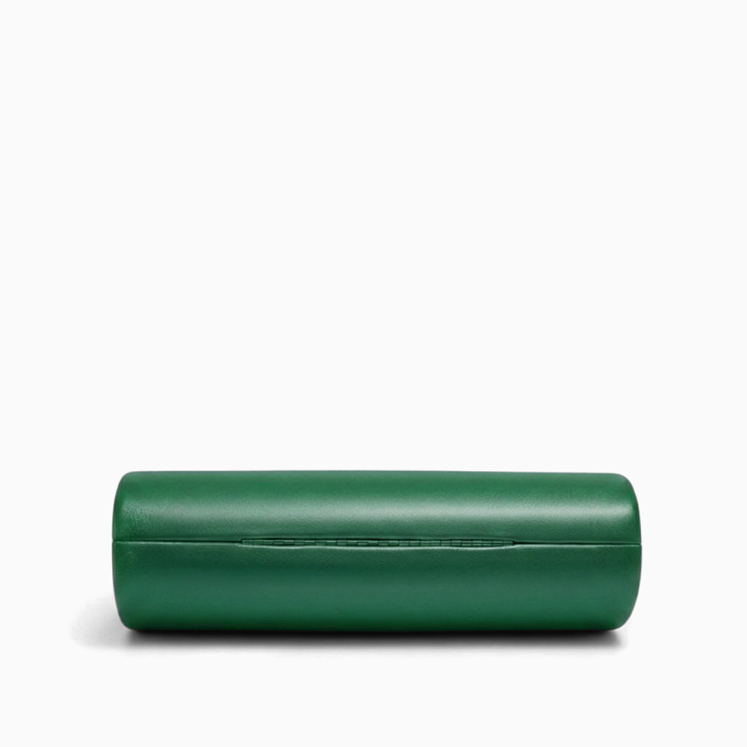 A sleek emerald green cylindrical Maren handbag with matte finish and subtle stitching for stylish carrying