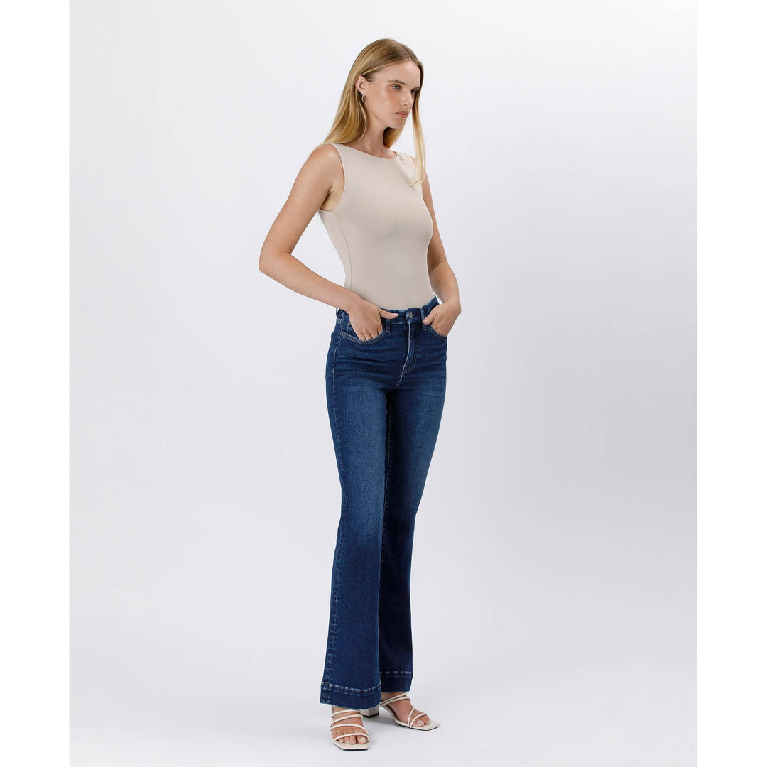 High rise trouser denim in dark blue high waisted flare jeans with classic five pocket design and stitched detailing