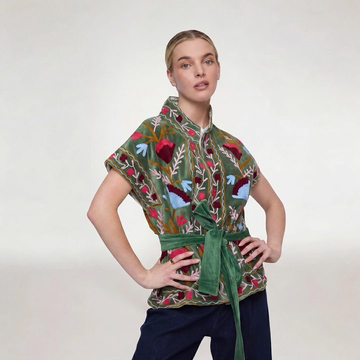 Olive green velvet Jaipur embroidered jacket with intricate red blue and gold floral embroidery on the front