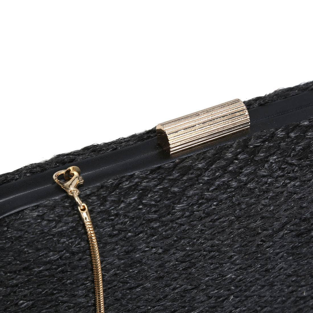 Quinn evening bag black textured clutch with gold-toned zipper pull and decorative ridged metal clasp