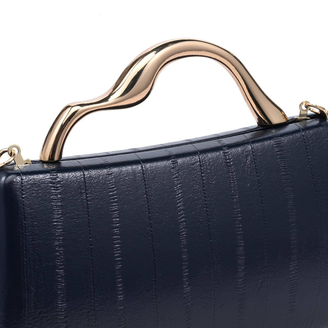 Navy textured leather clutch with a sleek gold-tone curved handle designed for elegant occasions