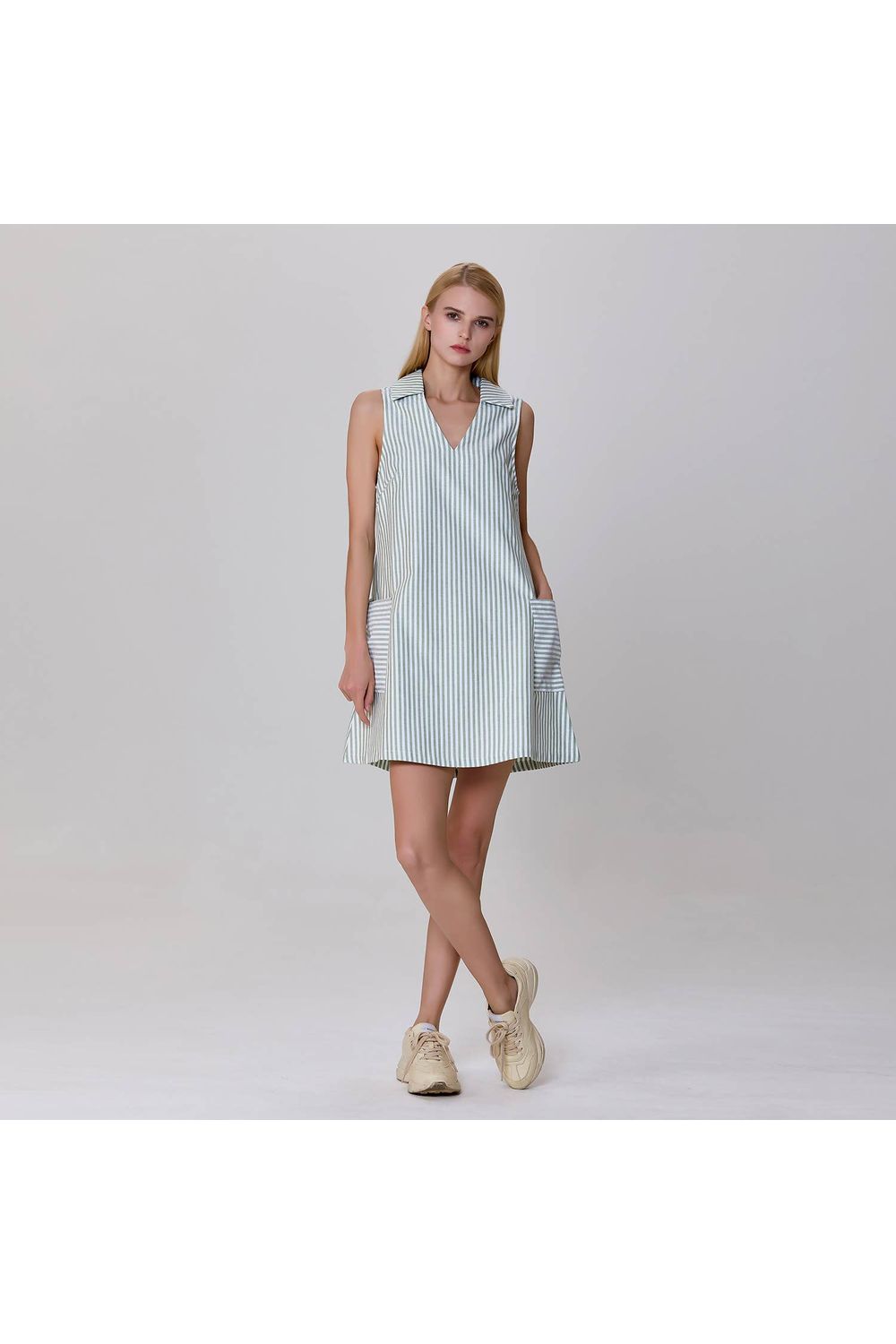 Minimalist striped trapeze mini dress green and white