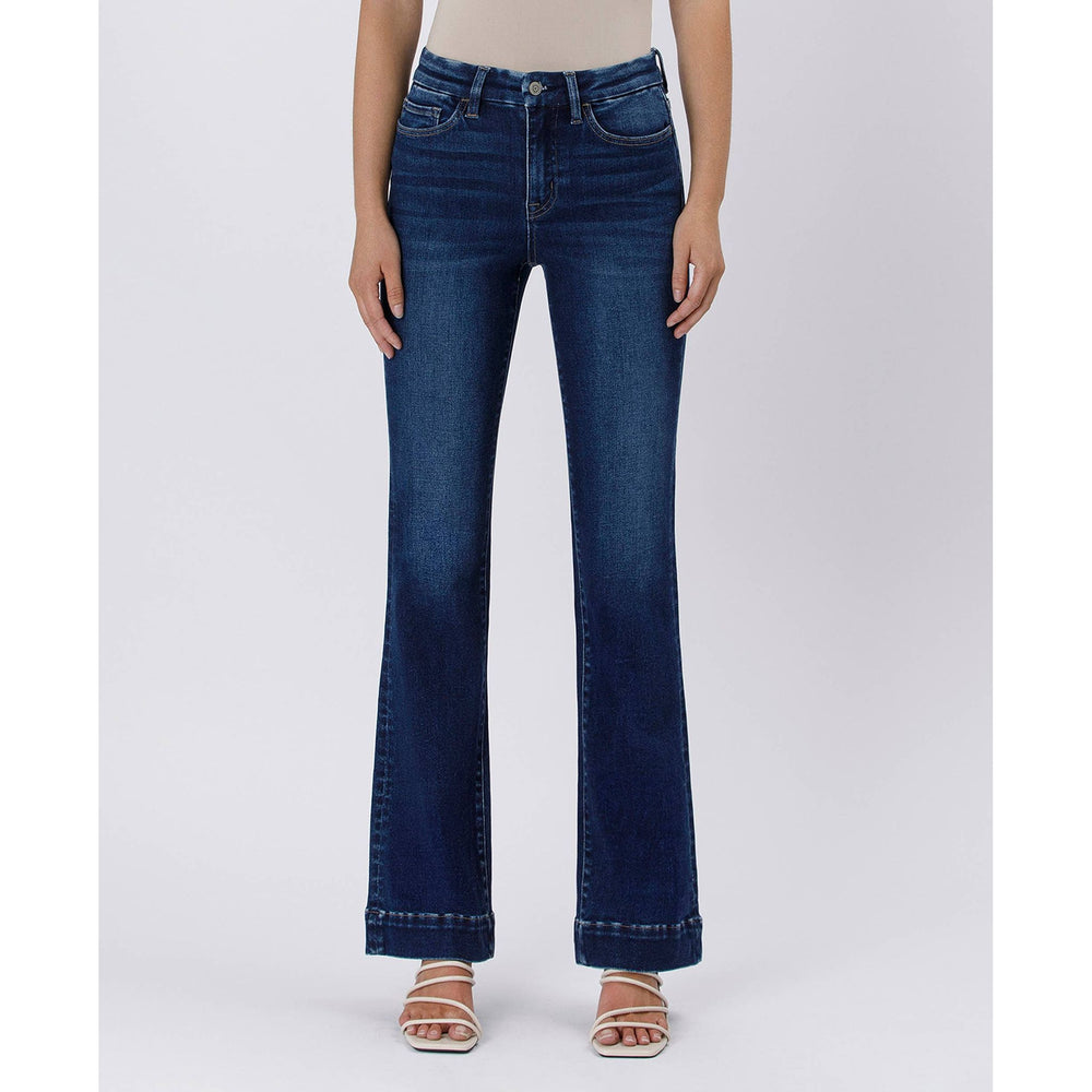 Dark blue high rise trouser denim jeans with flared legs classic five-pocket design and rolled cuffs