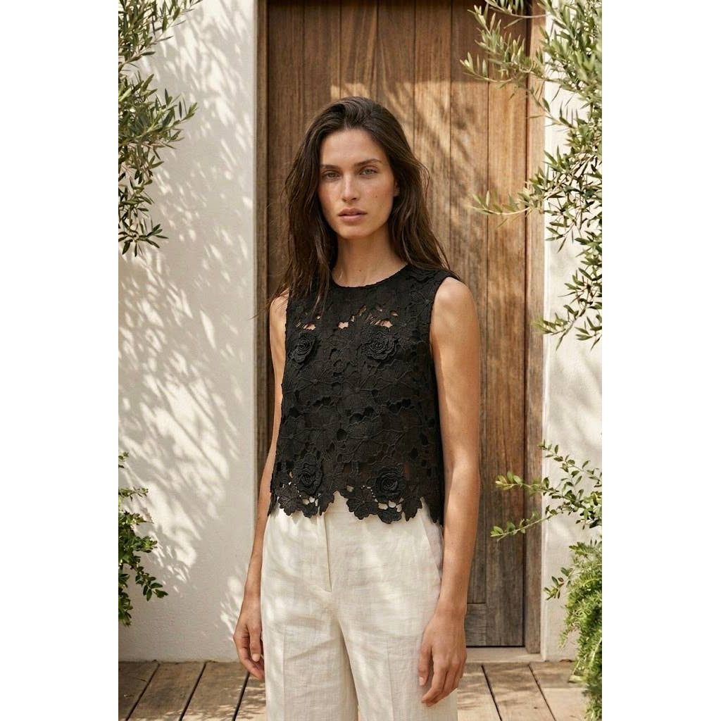 Black lace sleeveless floral applique top with detailed embroidery perfect for elegant occasions
