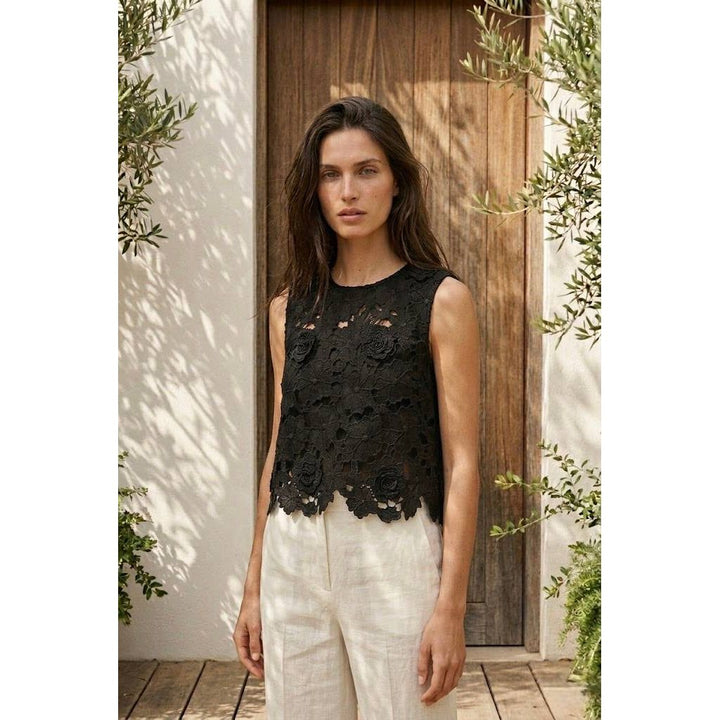 Black lace sleeveless floral applique top with detailed embroidery perfect for elegant occasions