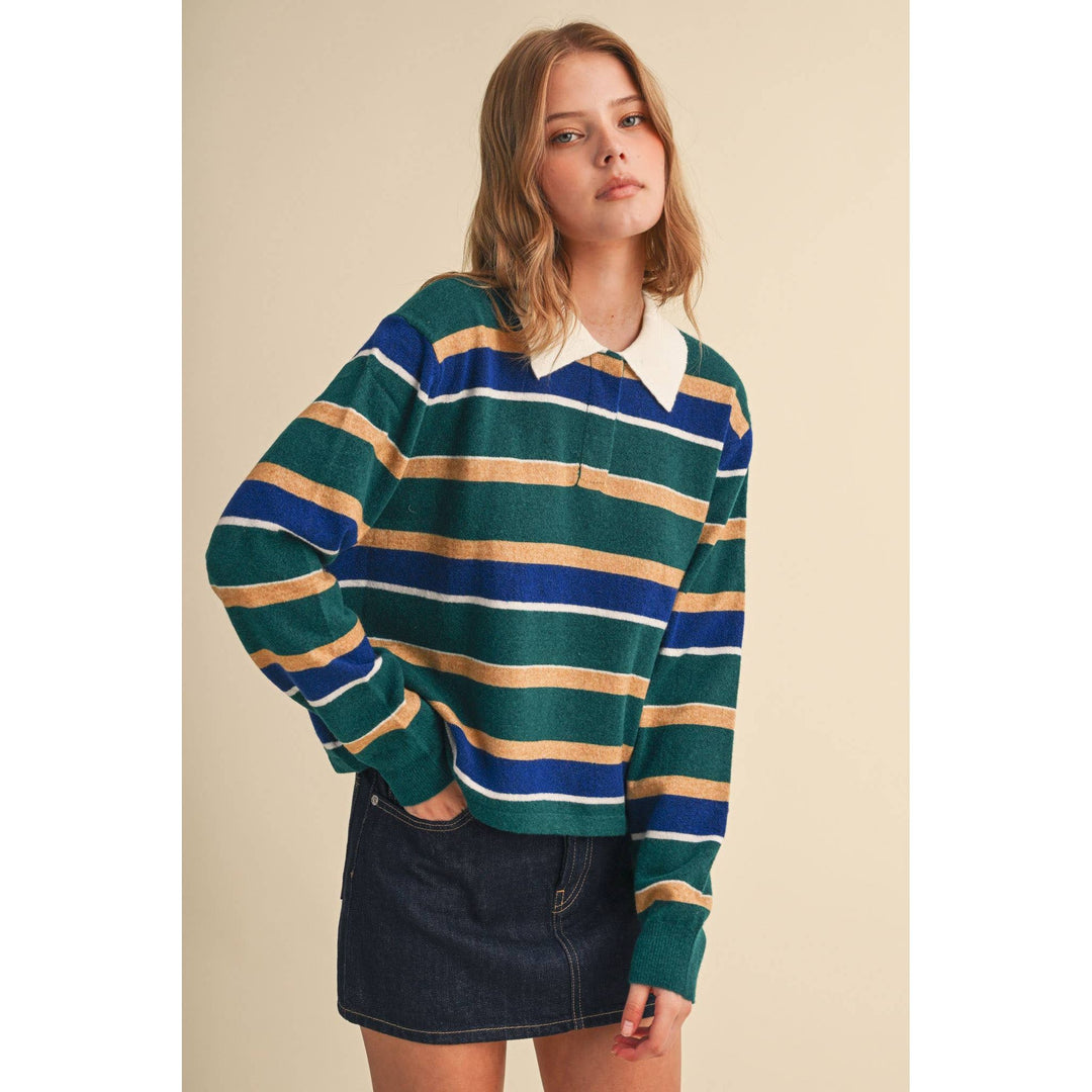 Striped polo sweater in pine, royal, and tan with bold horizontal stripes and a white collar in rugby style