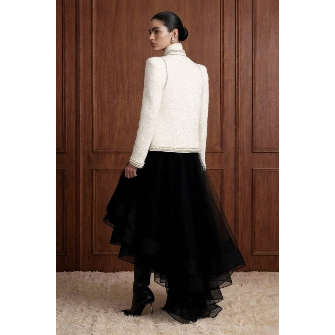 White textured tweed military jacket with pearl embellishments and high collar in bouclé fabric