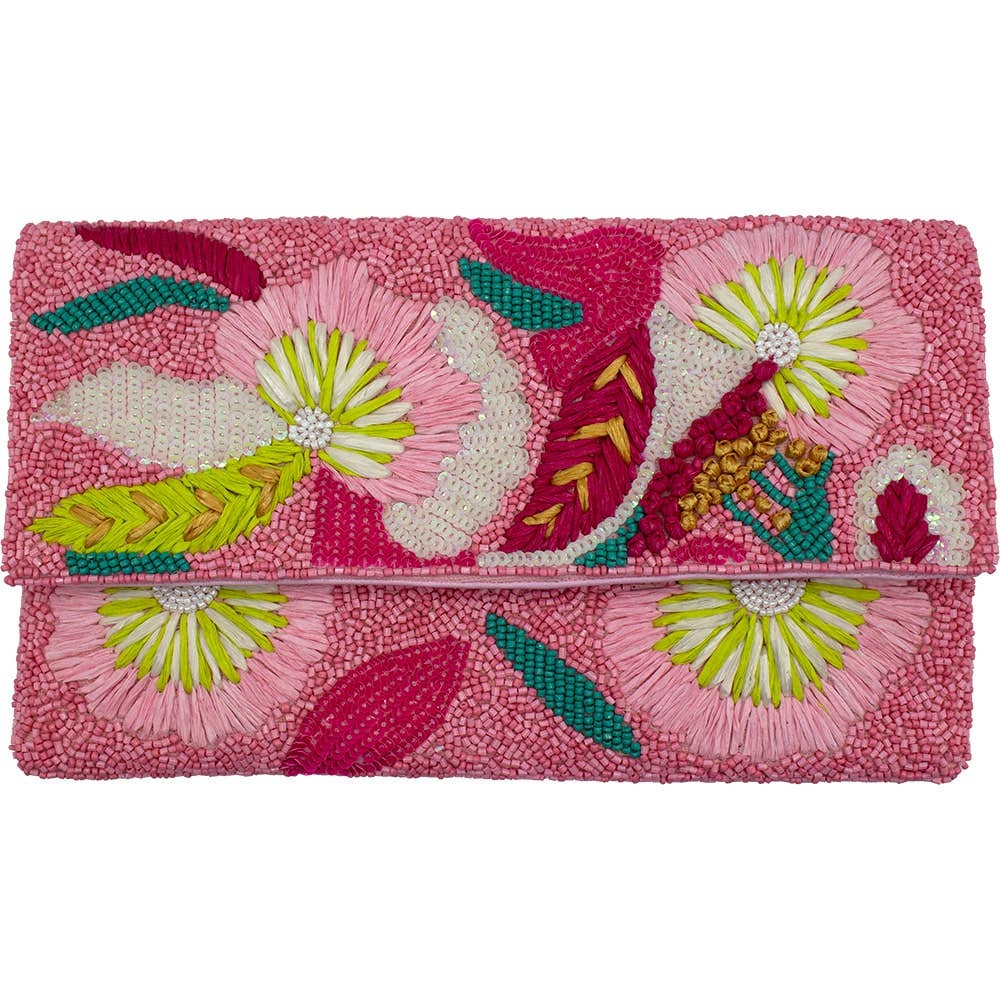 A vibrant pink beaded clutch with intricate fuchsia lime green and white floral patterns for elegant occasions
