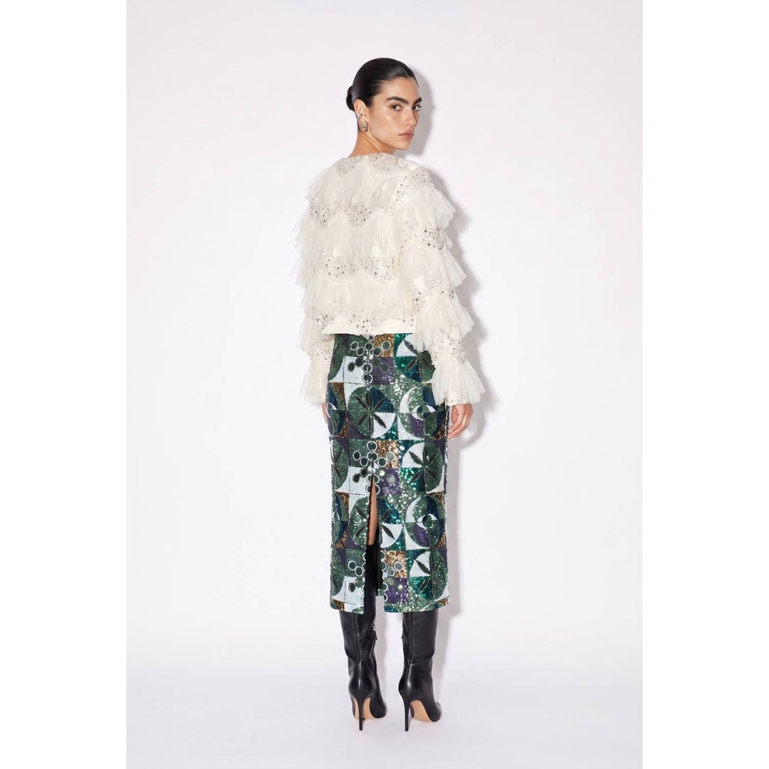 White ruffled lace top with beaded detailing paired with a sequin embellished skirt for elegant occasions