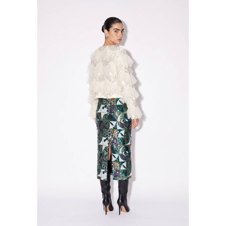 White ruffled lace top with beaded detailing paired with a sequin embellished skirt for elegant occasions