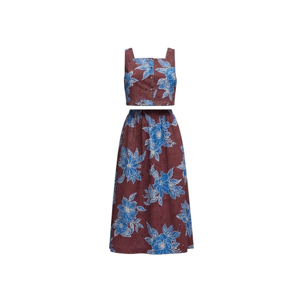 The Pearl Pagoda Bordeaux Blooms midi skirt and matching crop top in wine cotton eyelet with blue floral embroidery.