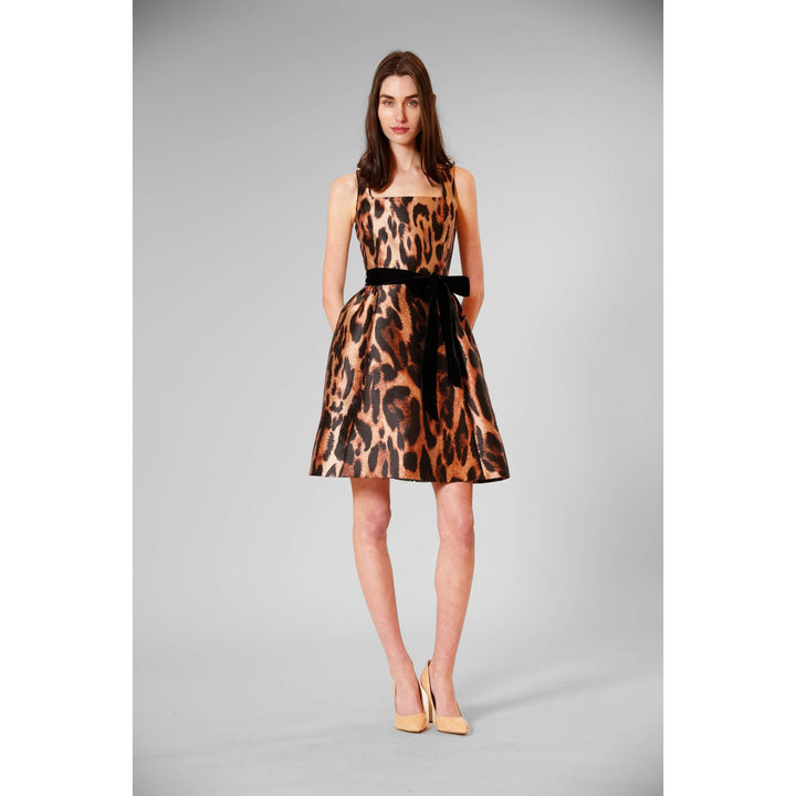 The Pearl Pagoda leopard print cocktail mini dress in twill with a square neckline and black waist-cinching belt.