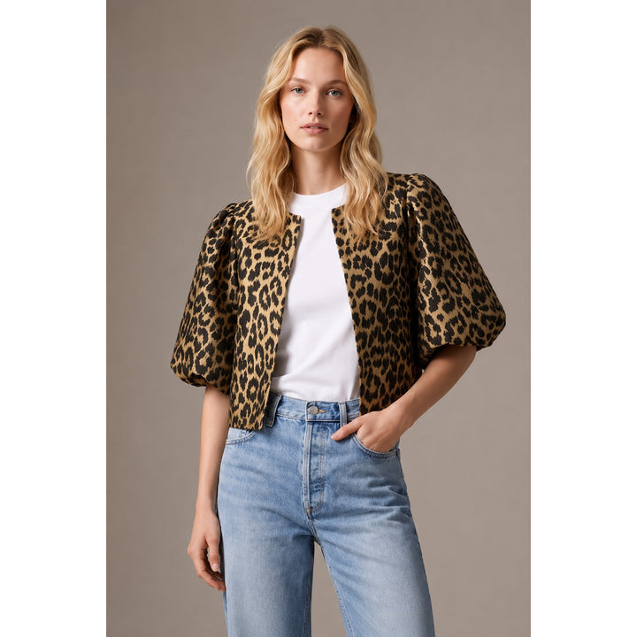 The Pearl Pagoda leopard print cropped jacket with balloon sleeves and collarless neckline worn by a blonde model.