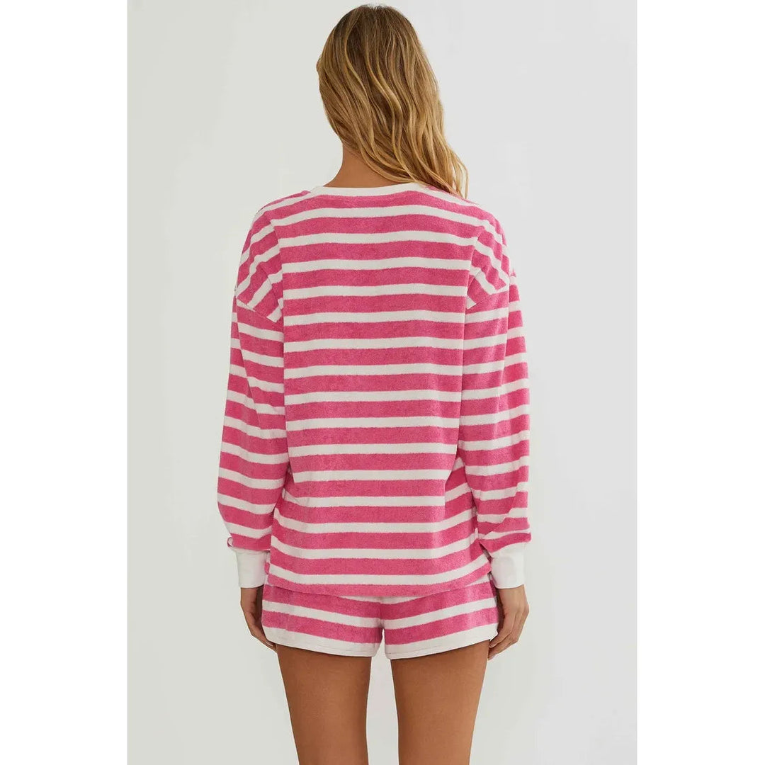 The Pearl Pagoda Fia short and Cyra top set in pink and white misty stripe soft terry cloth with a relaxed fit.