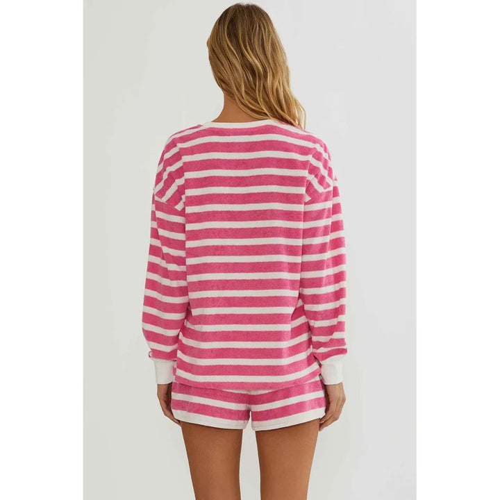 The Pearl Pagoda Fia short and Cyra top set in pink and white misty stripe soft terry cloth with a relaxed fit.