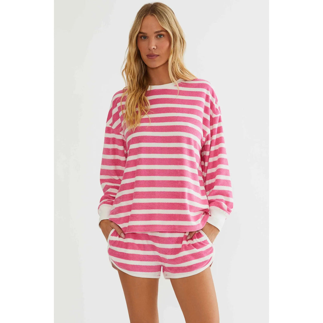 The Pearl Pagoda Fia short and Cyra top set in pink and white misty stripe soft terry cloth with a relaxed fit.
